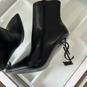 Yves Saint Laurent Black Heeled Boots with Logo Heel